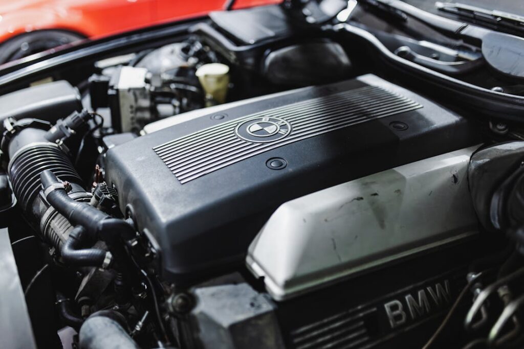 free photo of close up of car engine under hood